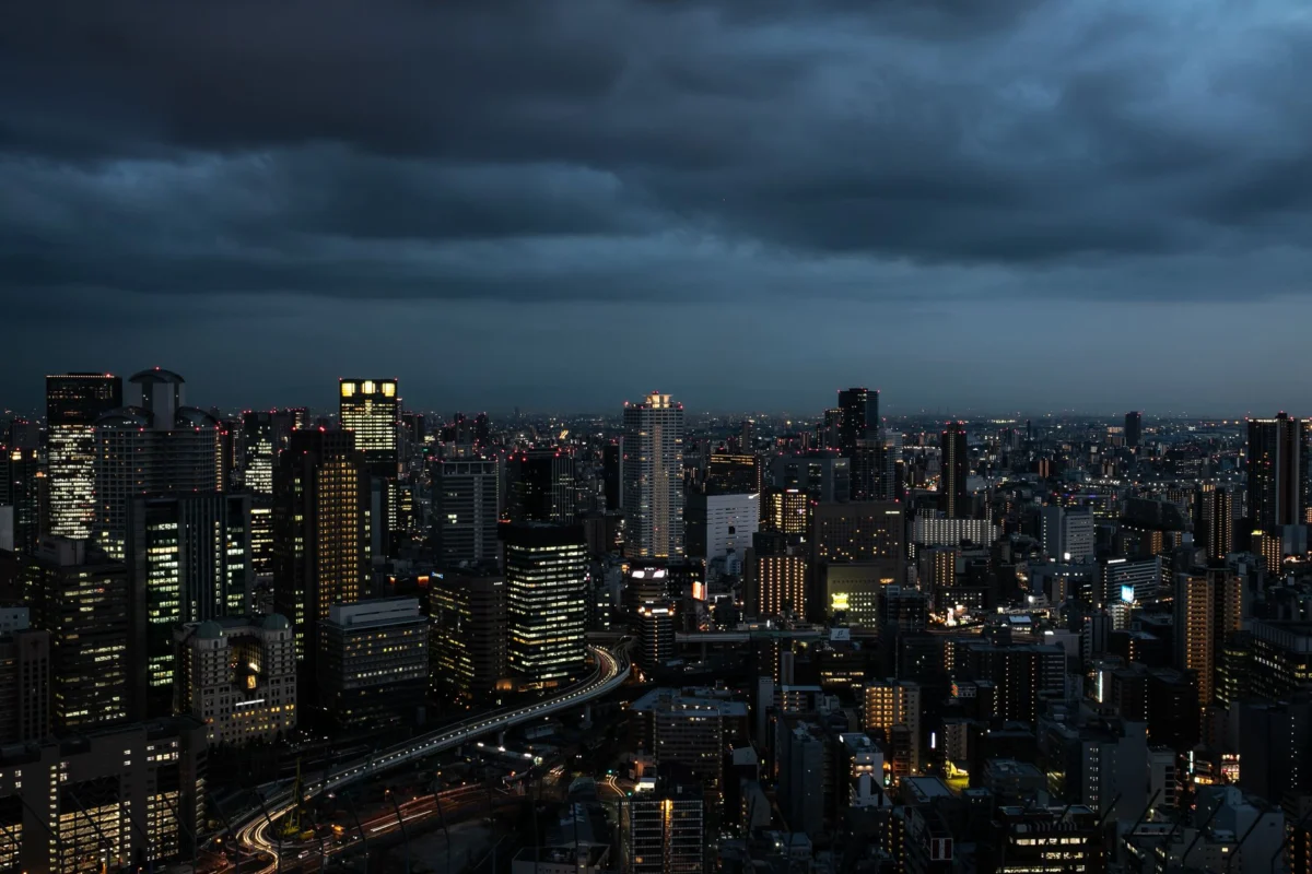 Night skyline view of Osaka's cityscape, highlighting its cultural depth