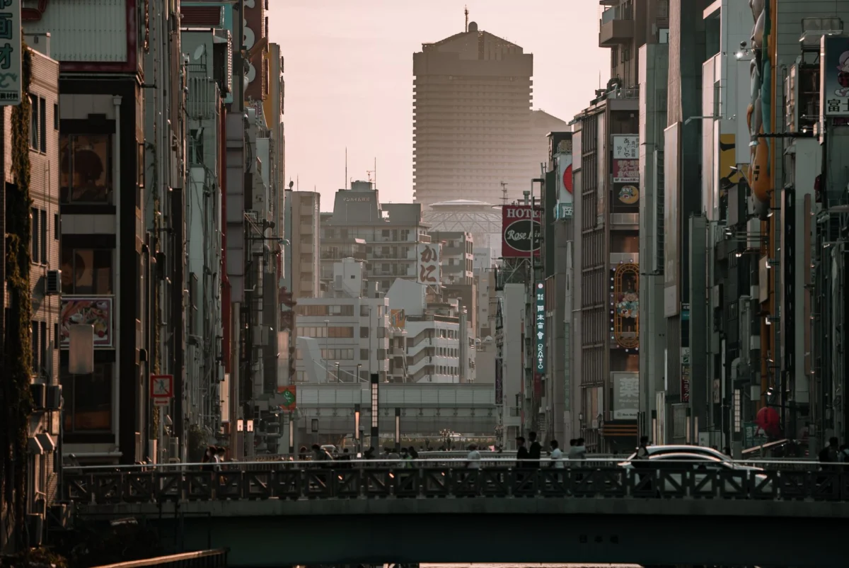 Skyline of Osaka with vibrant city lights at dusk
