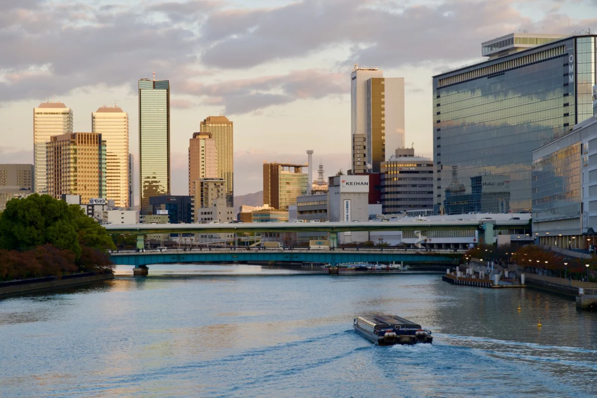 Evening view of Osaka skyline along the river