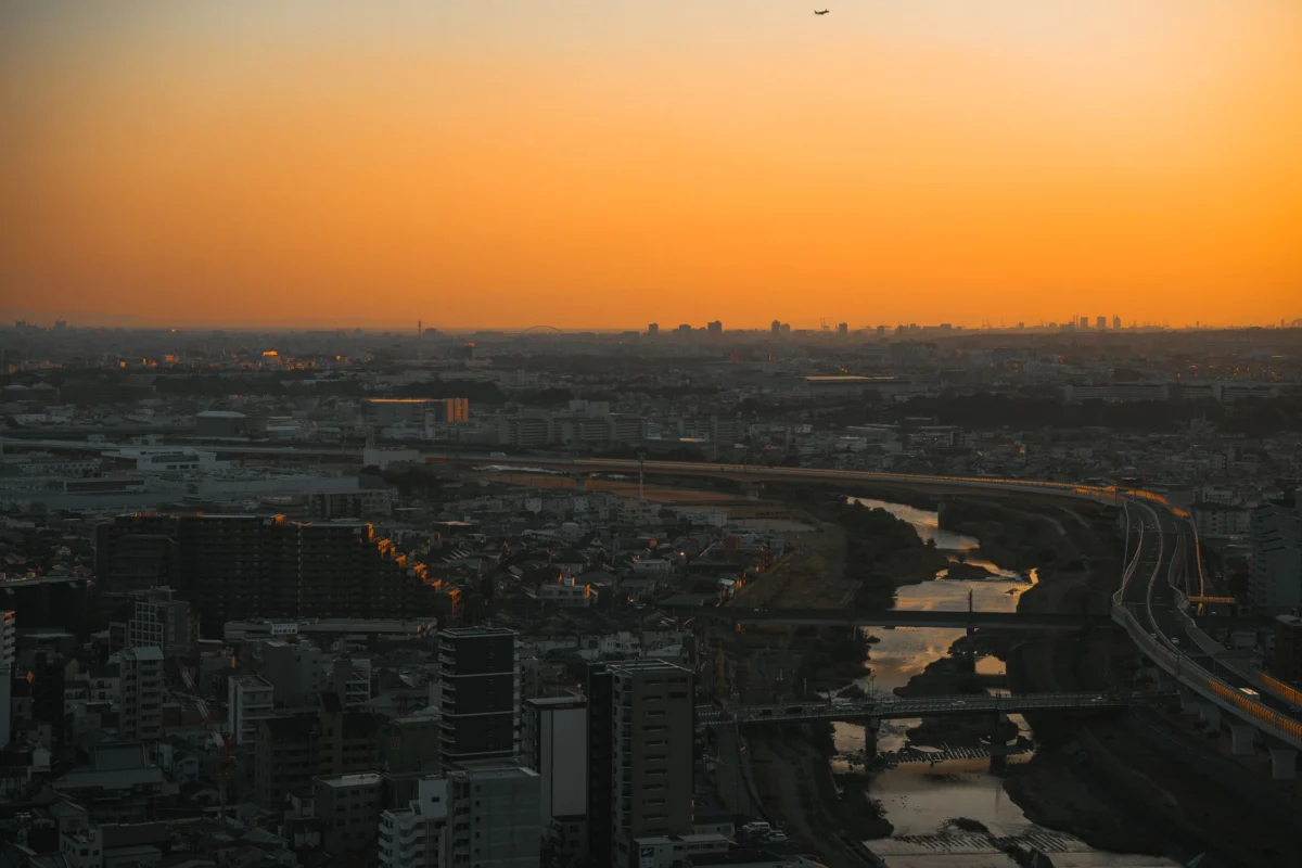 Romantic sunset over Osaka skyline, perfect for couple photography