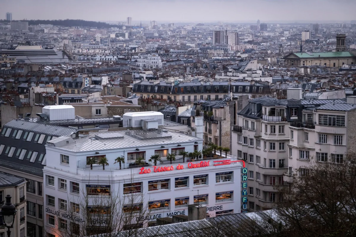 Paris city skyline view from a rooftop in summer