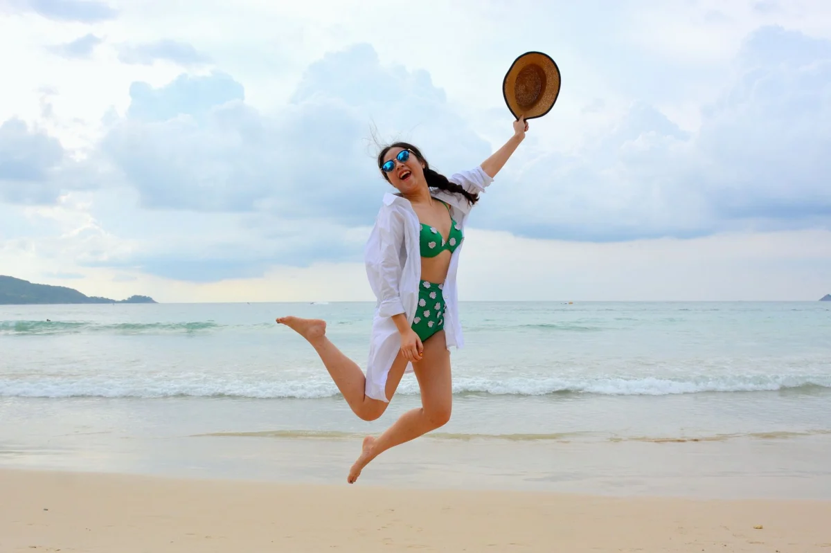 Nightlife view of Phuket's vibrant beach with bustling party scenes