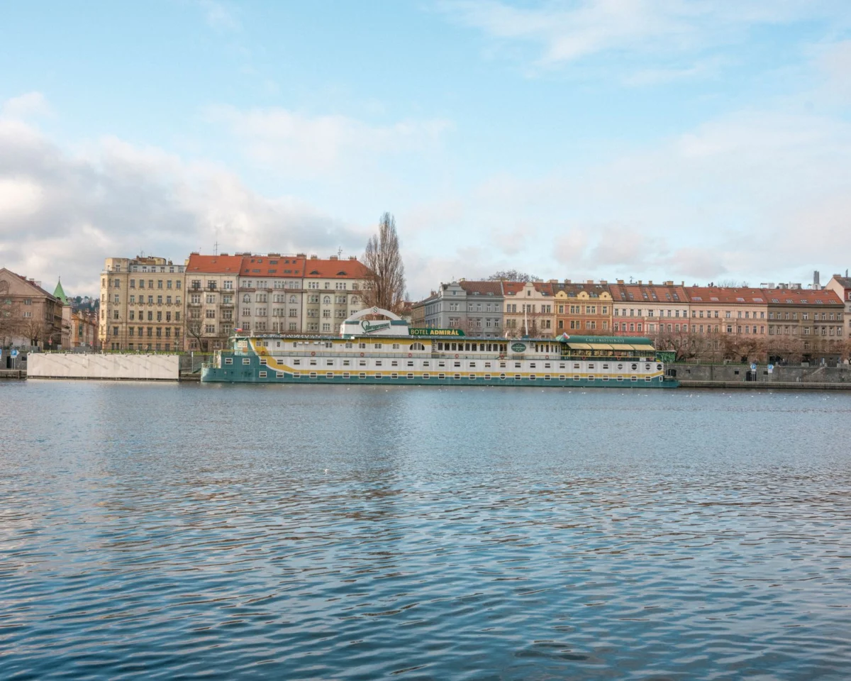 View of Prague cityscape with river and iconic architecture