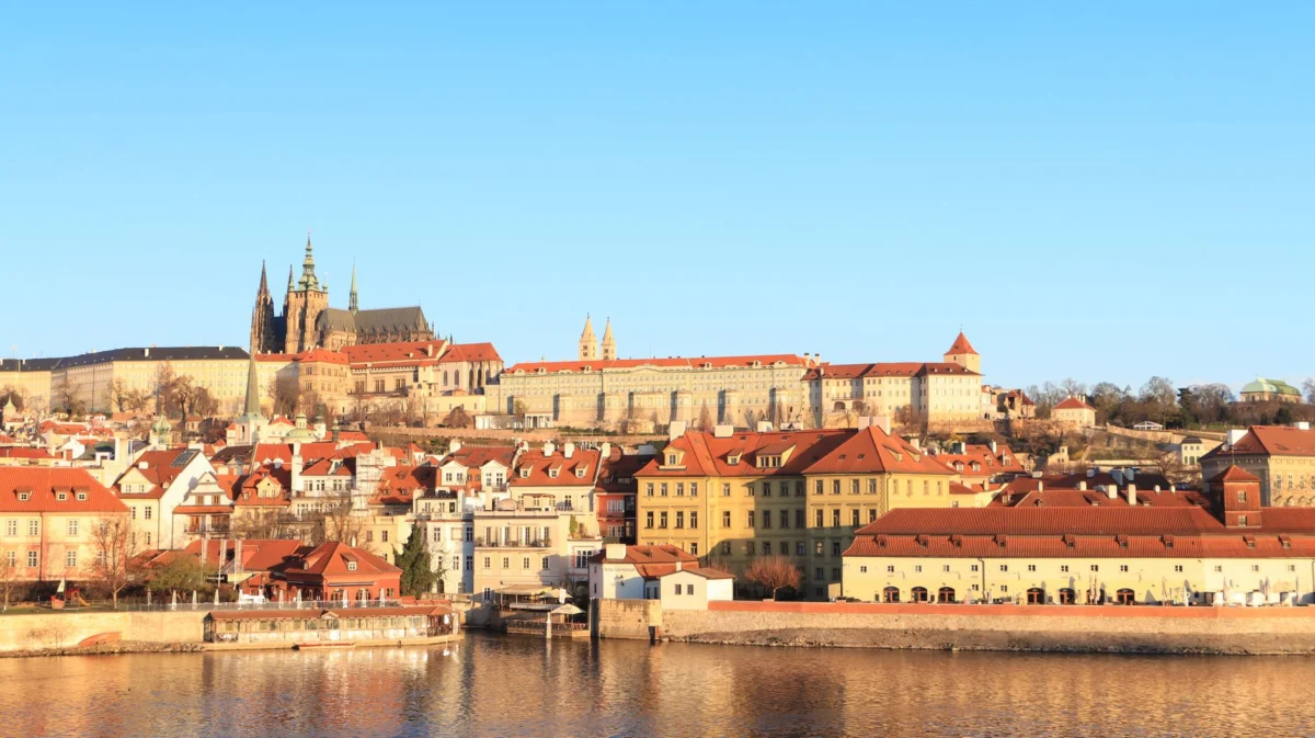 A romantic view of Prague's skyline at sunset