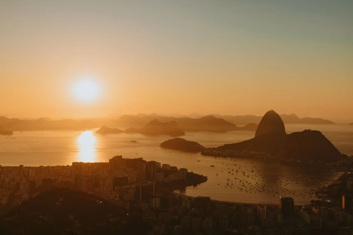 Sunset view of Rio de Janeiro skyline with iconic landmarks