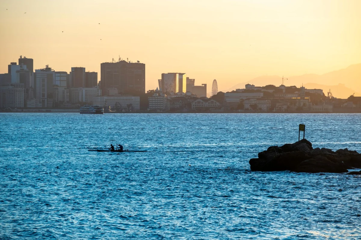 A panoramic view of Rio de Janeiro's city skyline at dusk