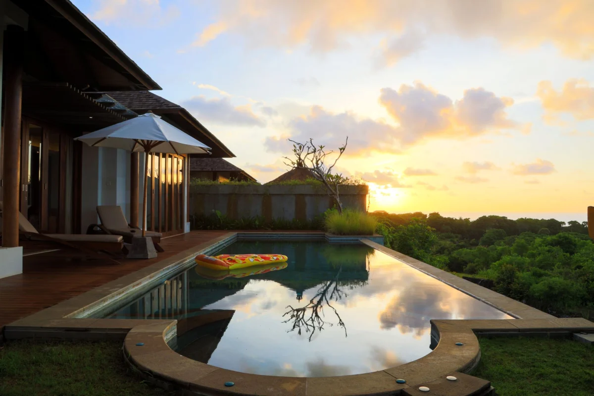 Romantic couple enjoying a hotel room with a view in Bali