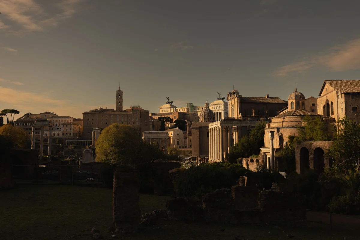 Rome skyline view with historic landmarks at sunset
