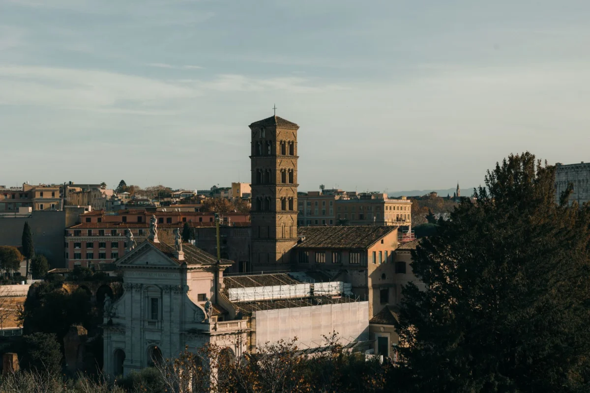 Rome skyline at sunset featuring St. Peter's Basilica