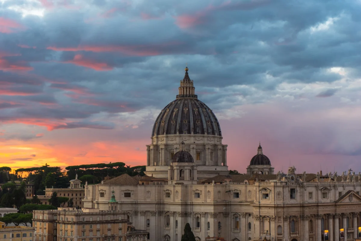 A beautiful sunset view over Rome with St. Peter's Basilica