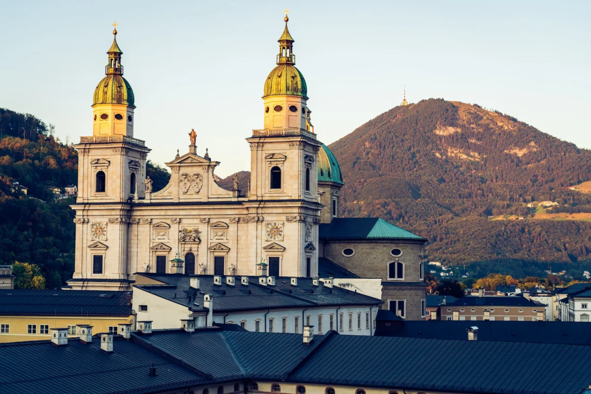 Majestic sunset view over Salzburg with historic architecture and river
