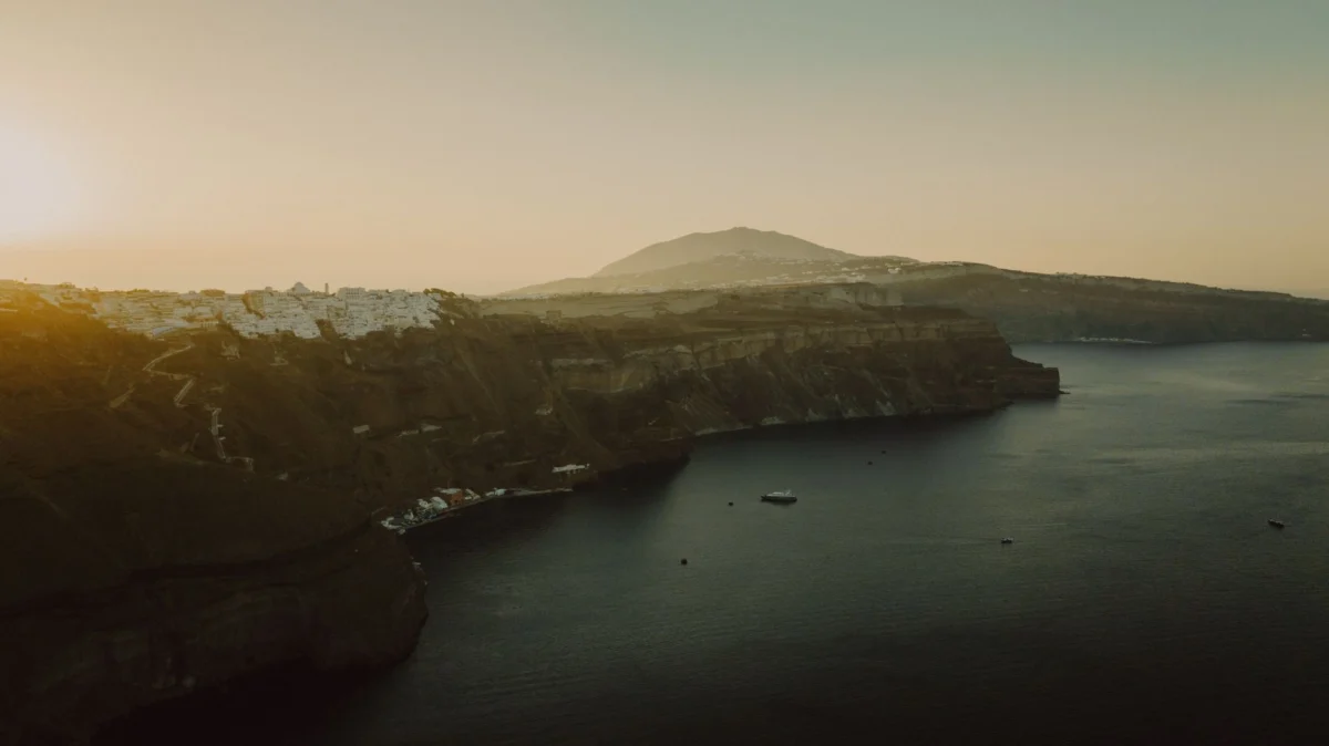 Santorini skyline at sunset with iconic white buildings
