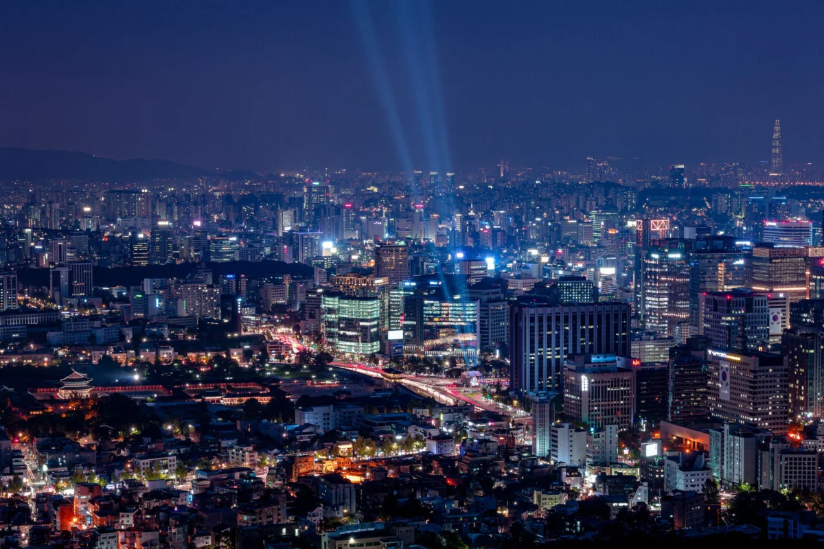 A stunning view of Seoul's iconic skyline at night featuring the Namsan Tower