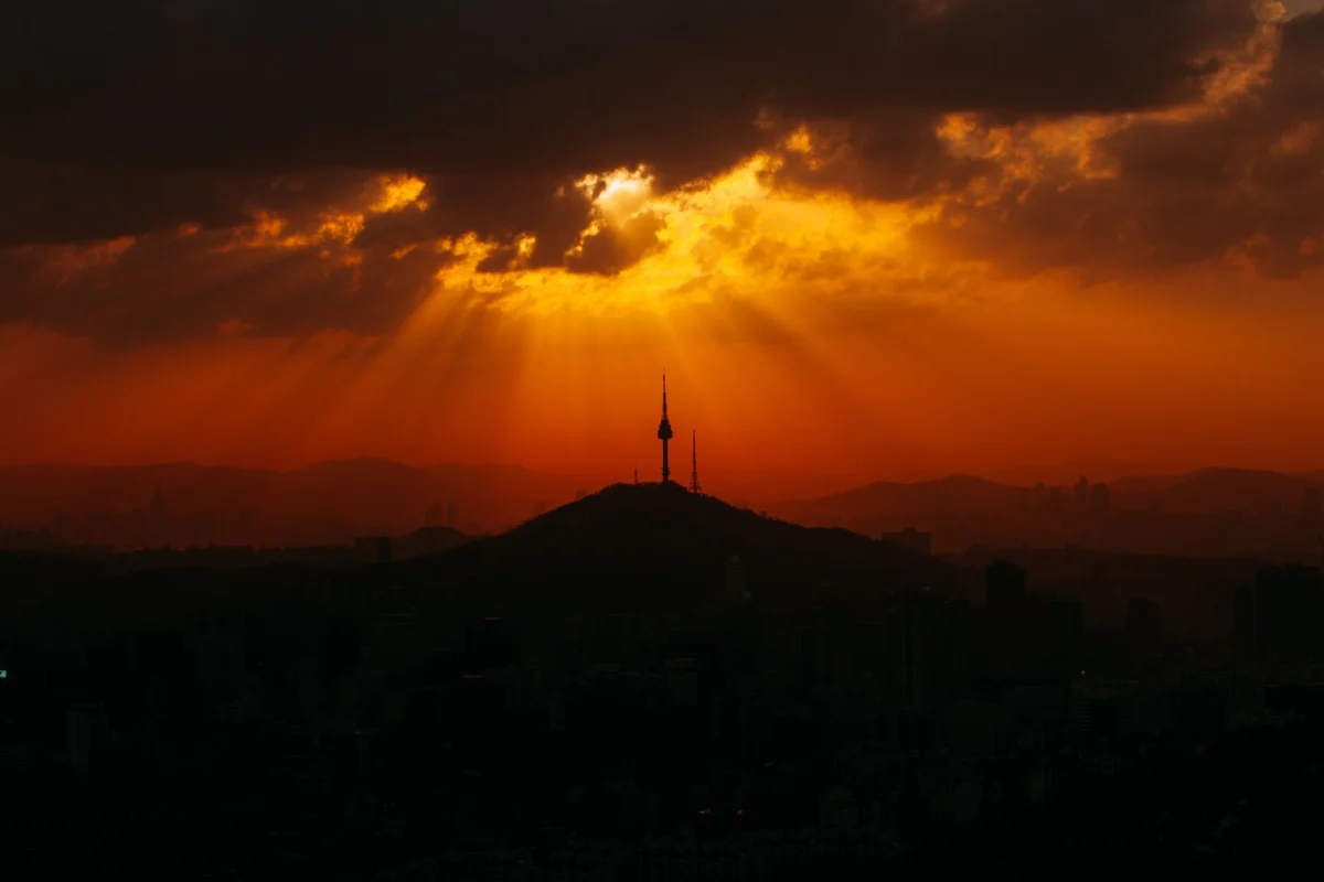 View of Seoul with the iconic Namsan Tower at sunset