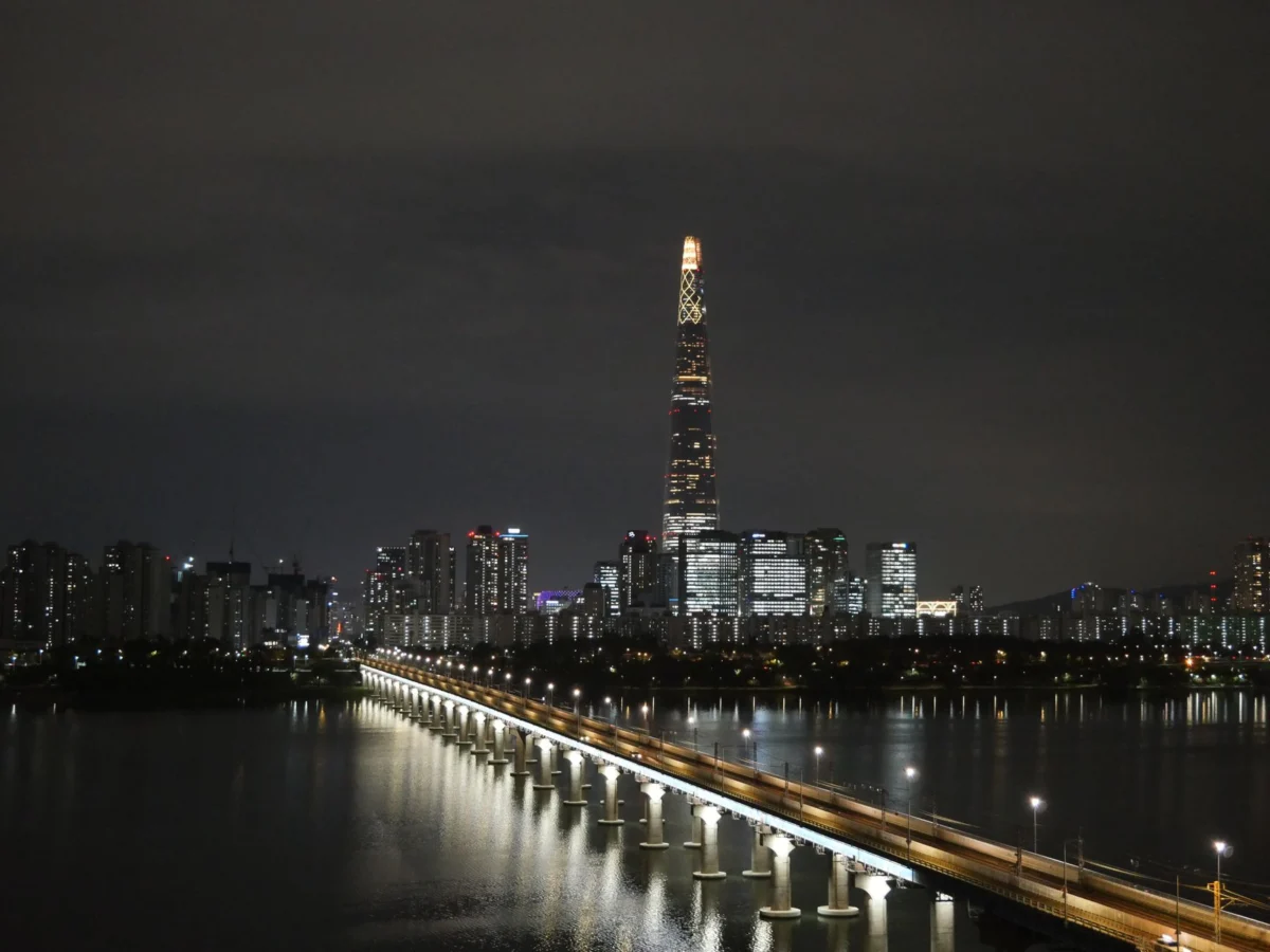 Night view of Seoul's skyline with iconic landmarks