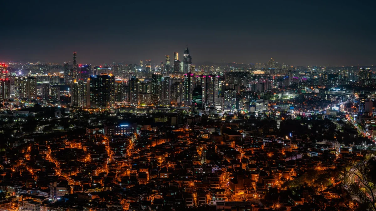 Seoul's vibrant skyline illuminated against the night sky