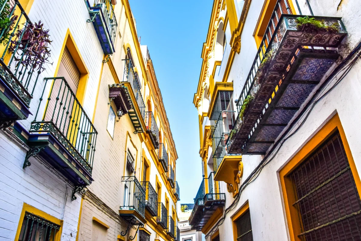 A picturesque historic street in Seville, showcasing the city's charm