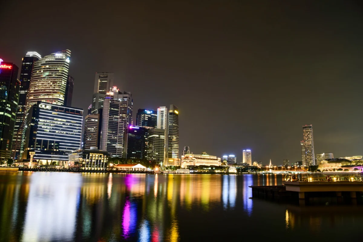 Singapore's skyline at night with luxury hotels