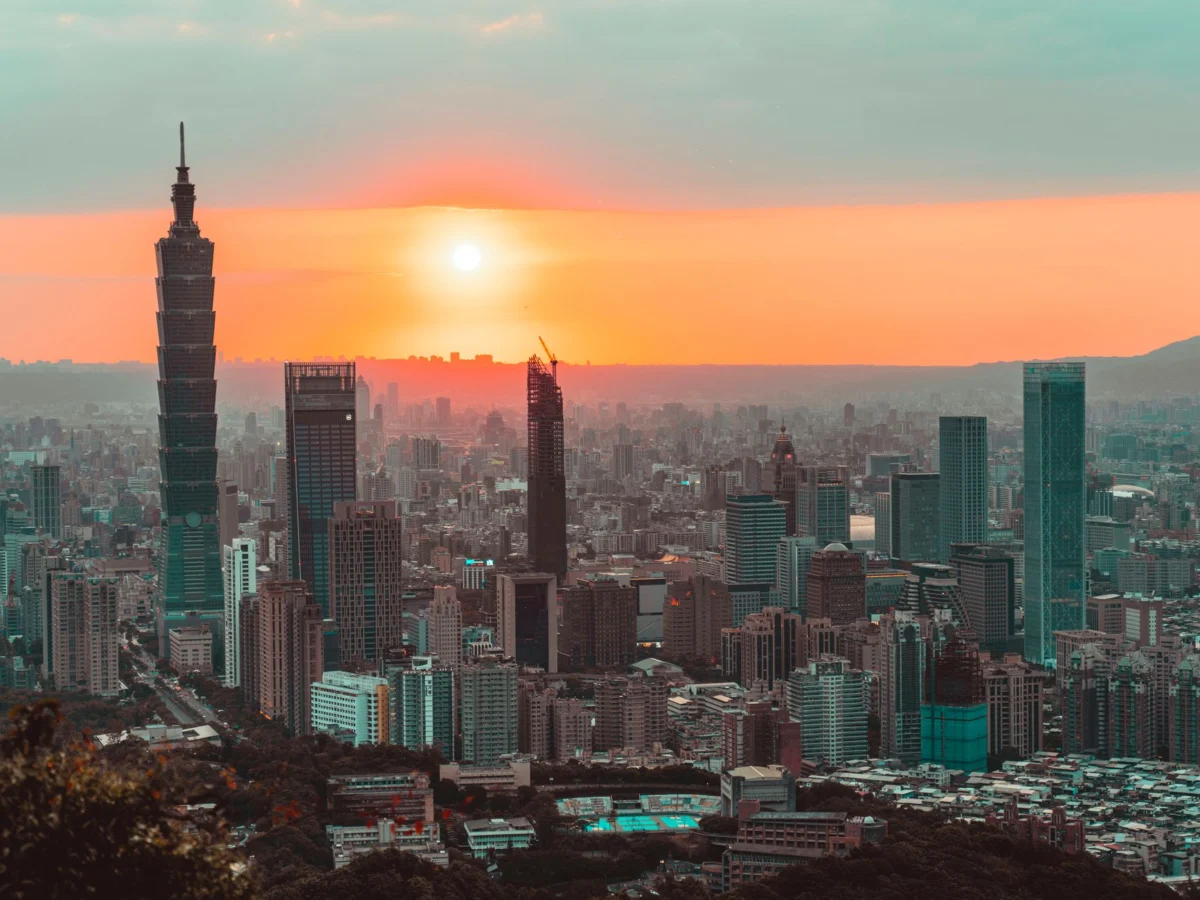 Elevated sunset view of Taipei cityscape with iconic skyline