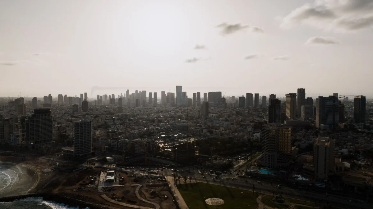 Dramatic view of Tel Aviv's skyline with beach