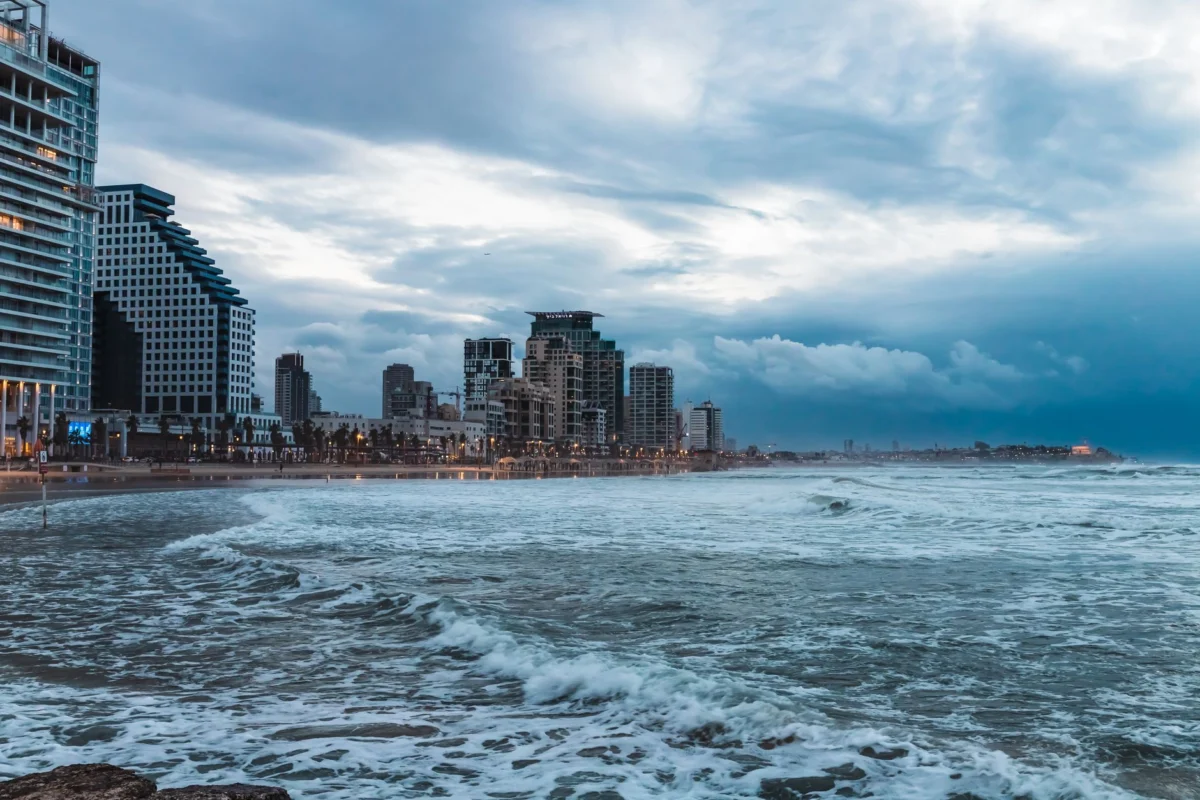 Tel Aviv skyline illuminated at dusk with city lights