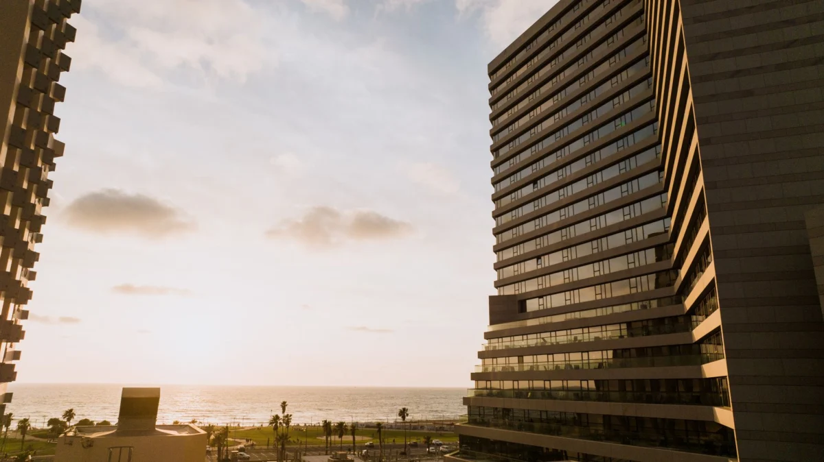 A romantic sunset skyline view of Tel Aviv