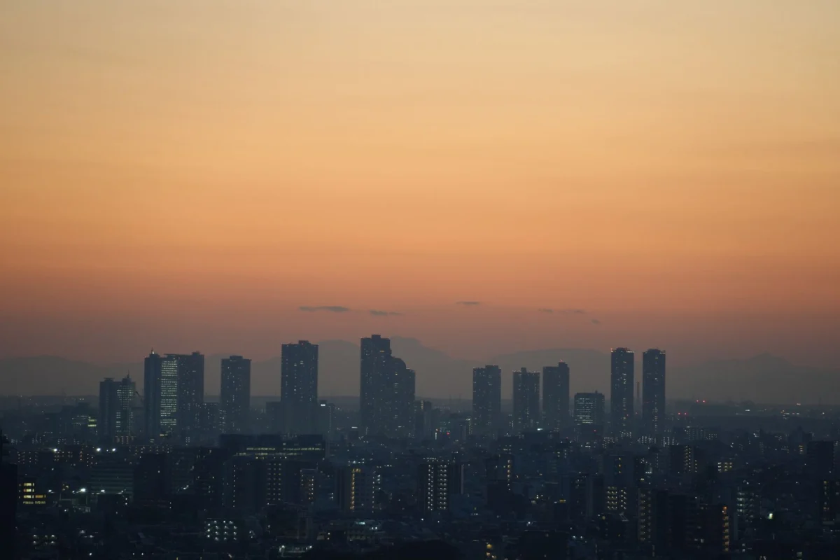 Tokyo skyline with city lights reflecting on the water
