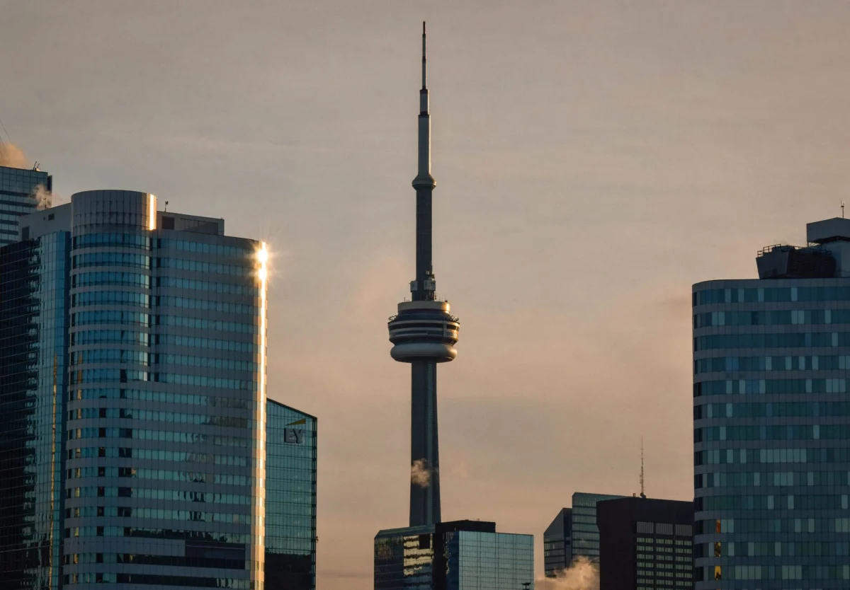 Toronto skyline with CN Tower at sunset, highlighting the cityscape