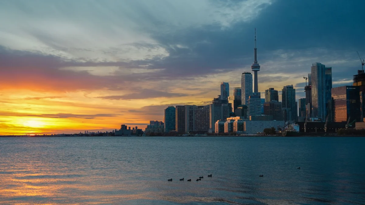 Toronto skyline at sunset showcasing hidden honeymoon gems