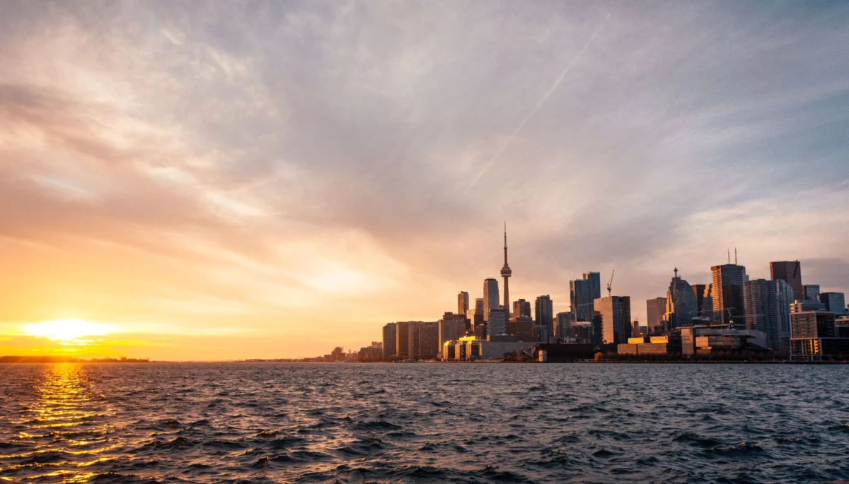 Toronto skyline at sunset with iconic CN Tower