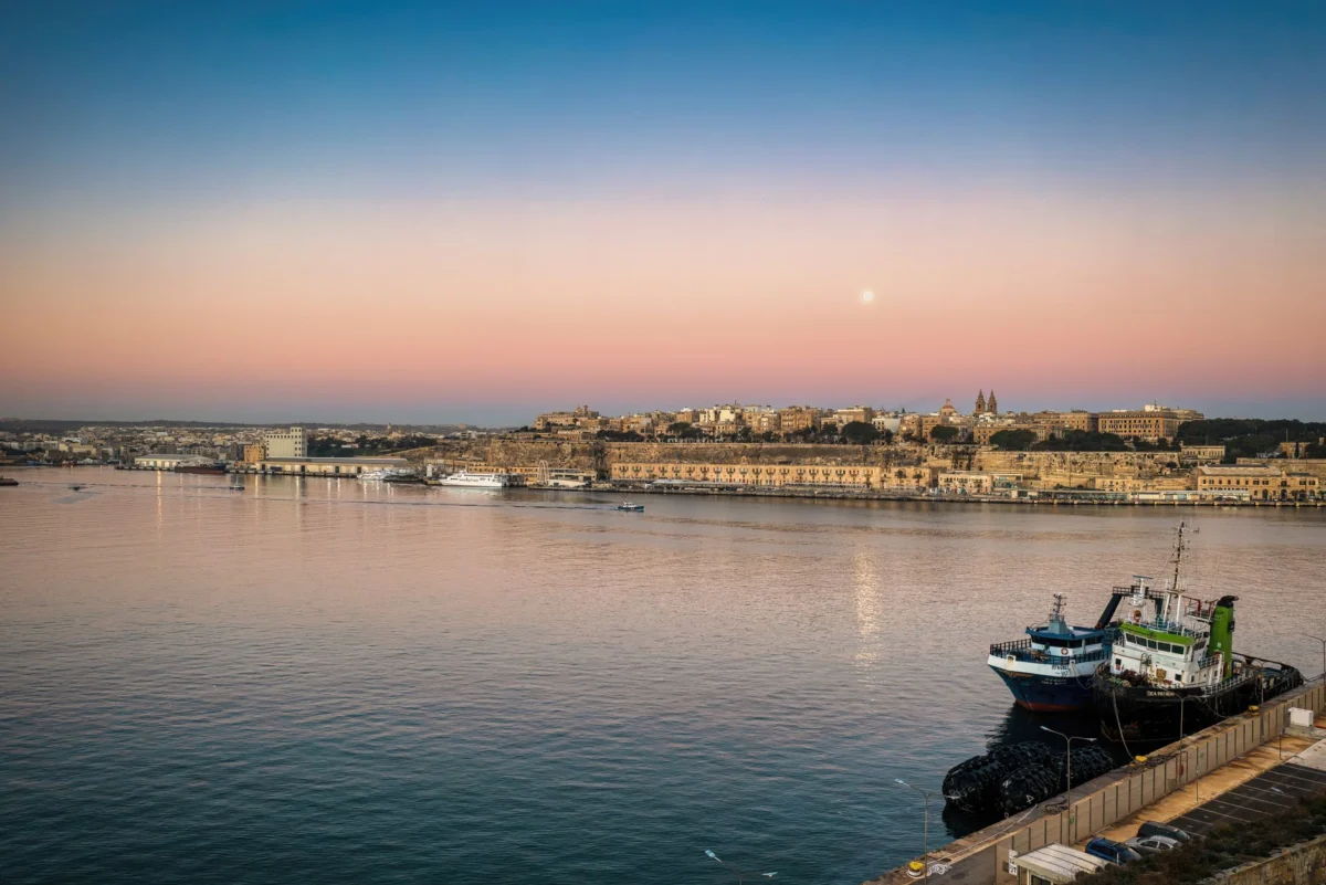 Romantic view of Valletta's cityscape at sunset
