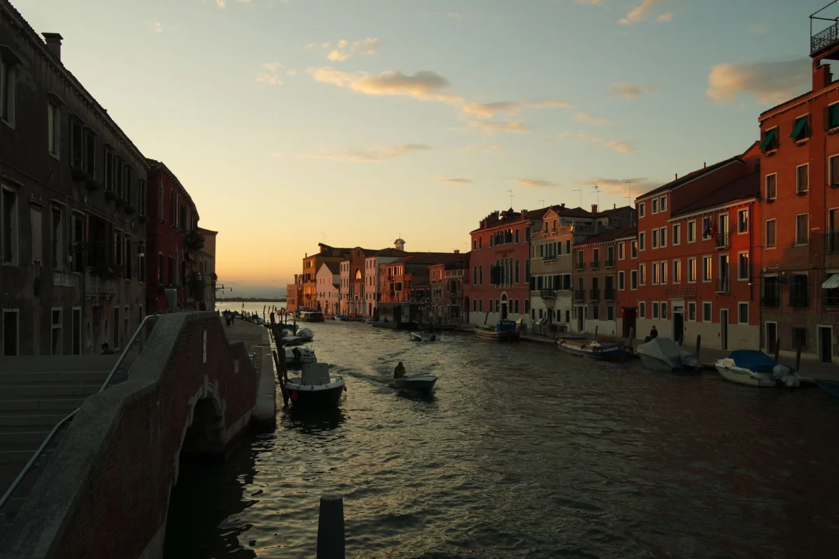 Dusk view of a Venice canal, a hidden gem for group travelers