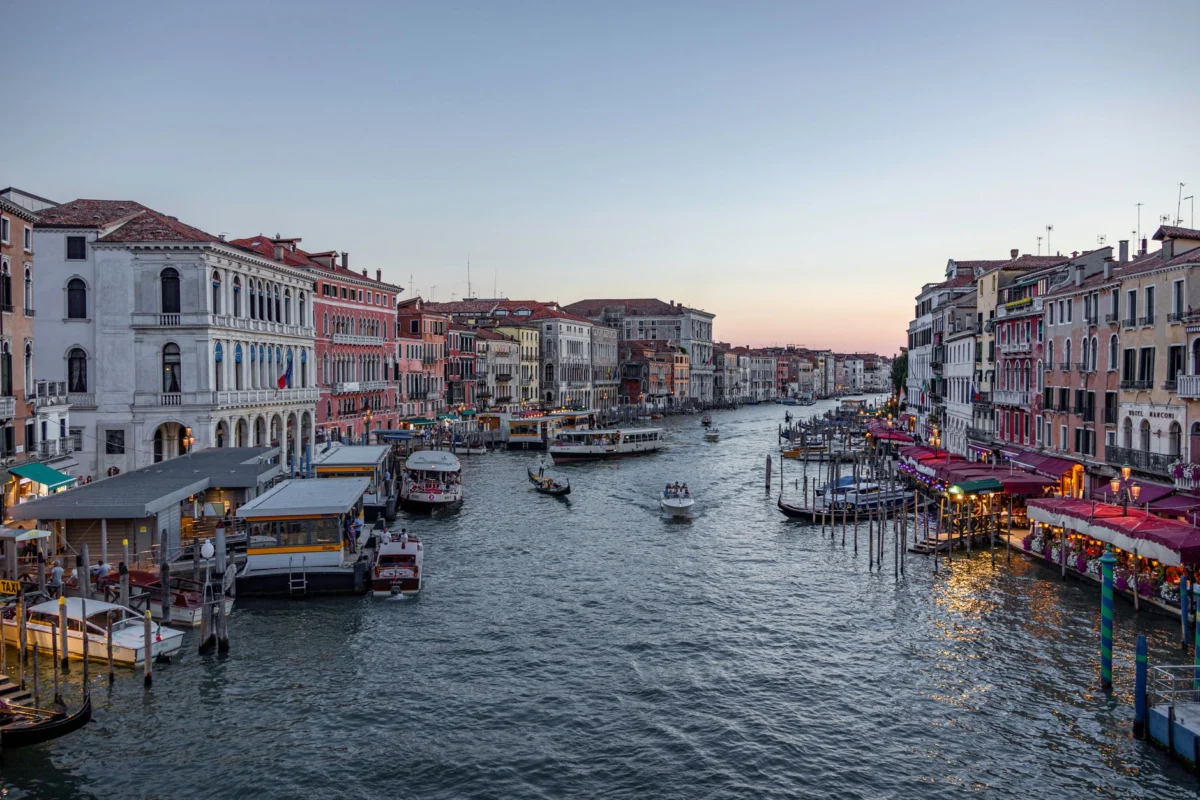 View of Venice's Grand Canal with gondolas at dusk