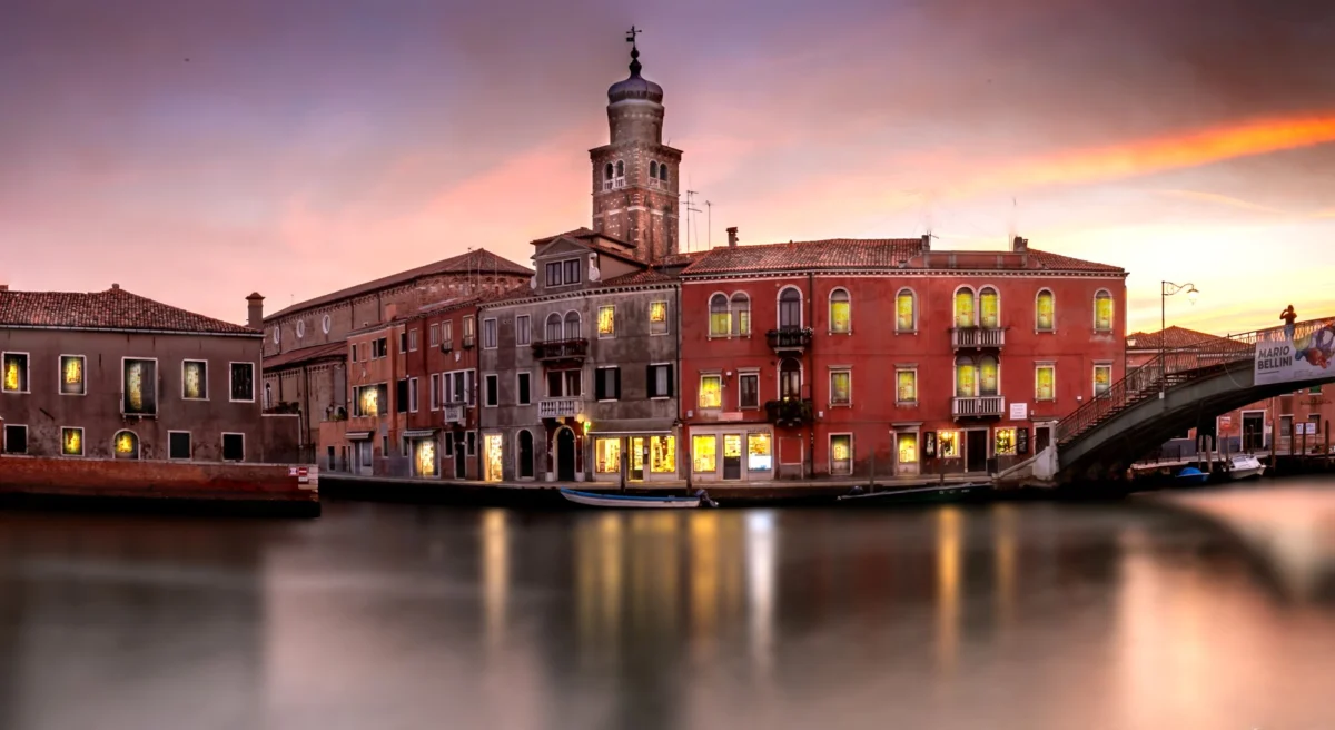Venice canal view with gondolas and historic architecture