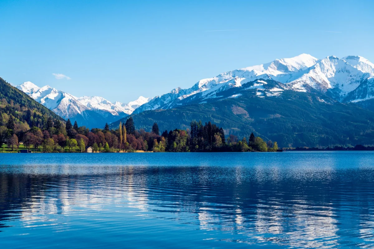 Romantic lakeside view of Zell am See with alpine backdrop