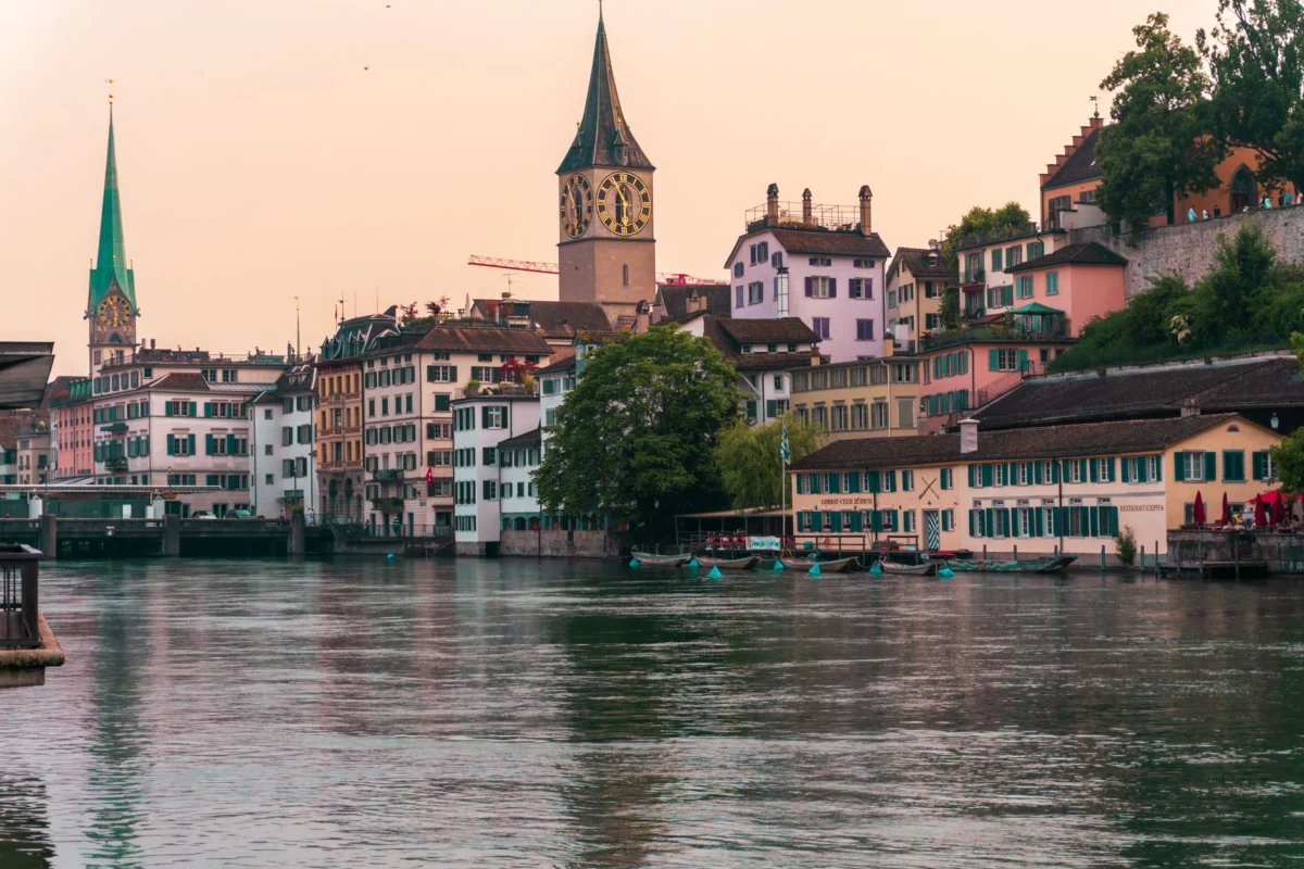 View of Zurich's iconic riverfront at sunset