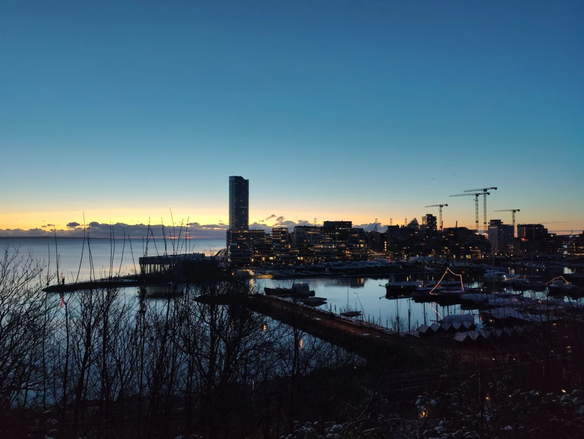 Romantic view of Aarhus skyline and harbor at dusk