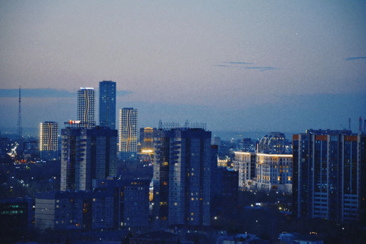 Stunning Almaty skyline view at sunset with city lights