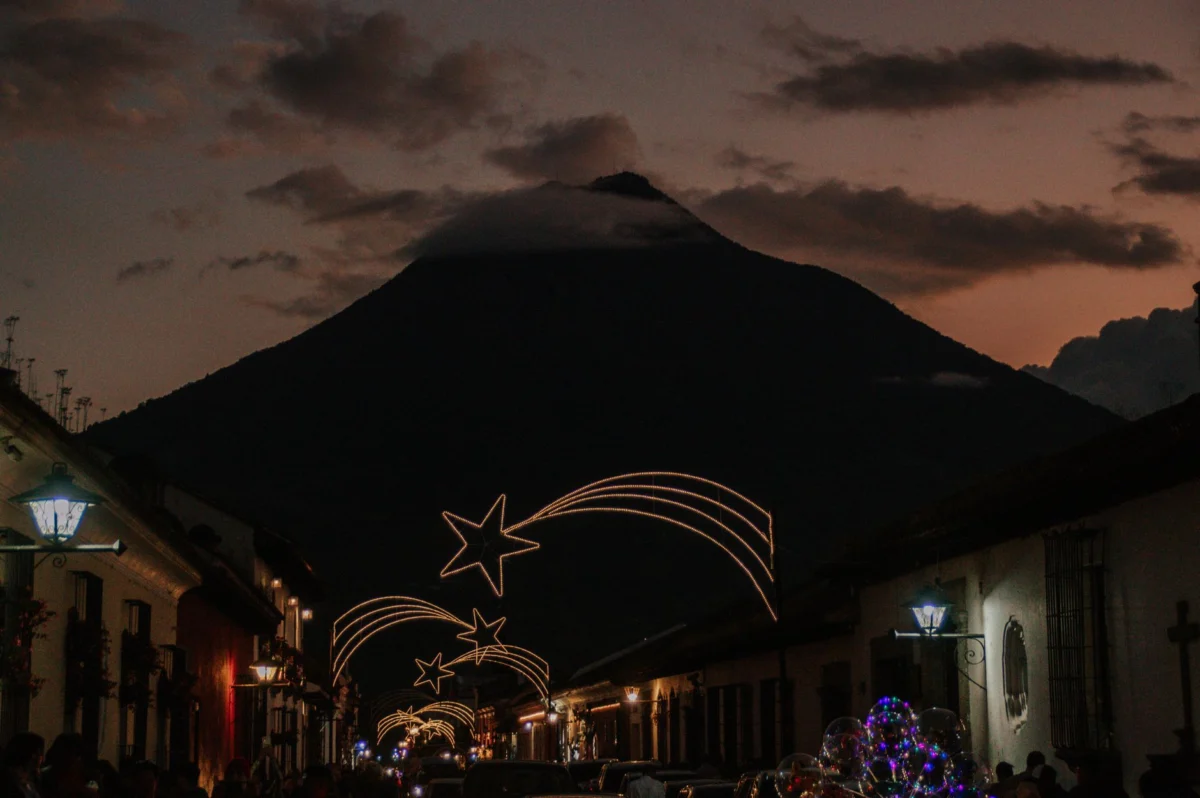 Sunset view over Antigua with charming rooftops and volcano backdrop