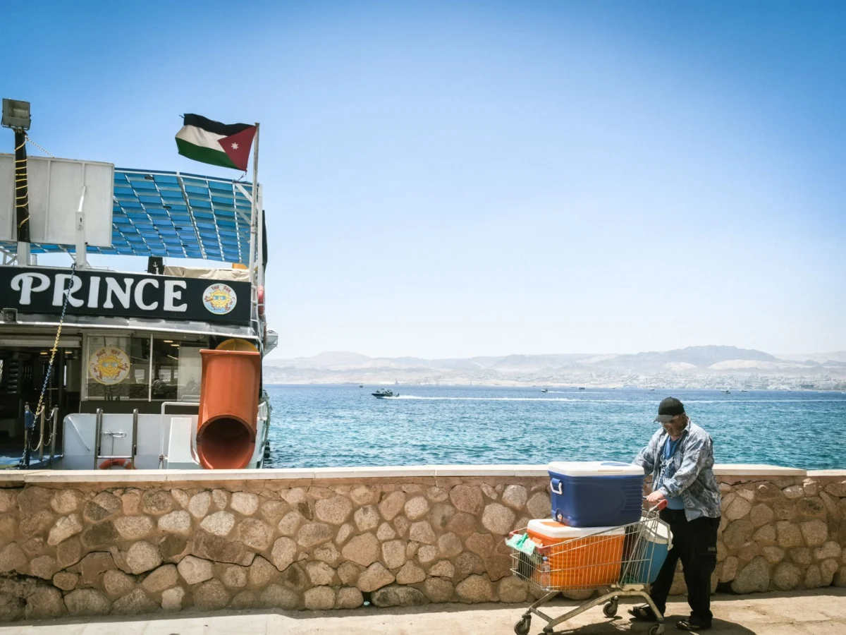A romantic view of Aqaba's coastline at sunset