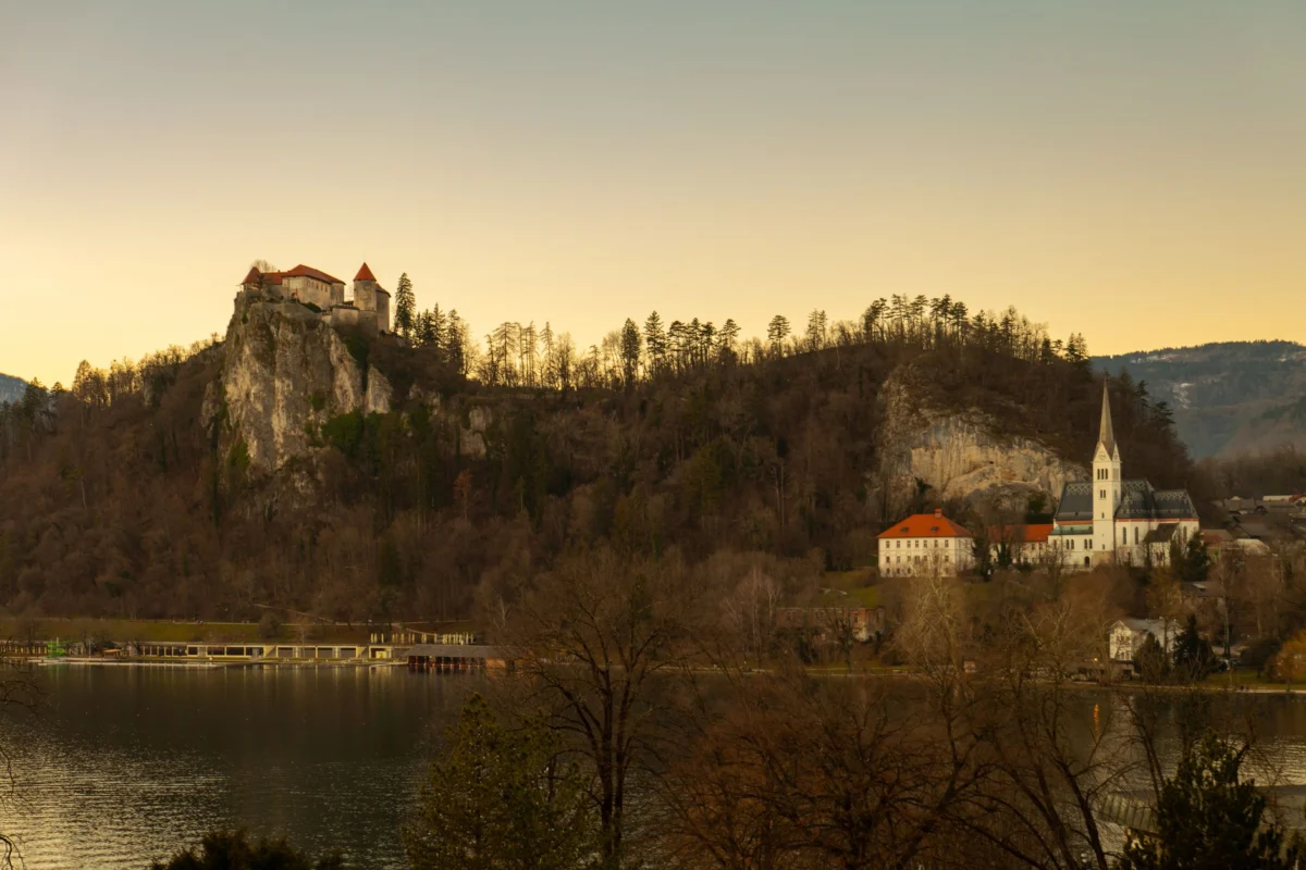 View of Bled Castle illuminated at twilight, Slovenia