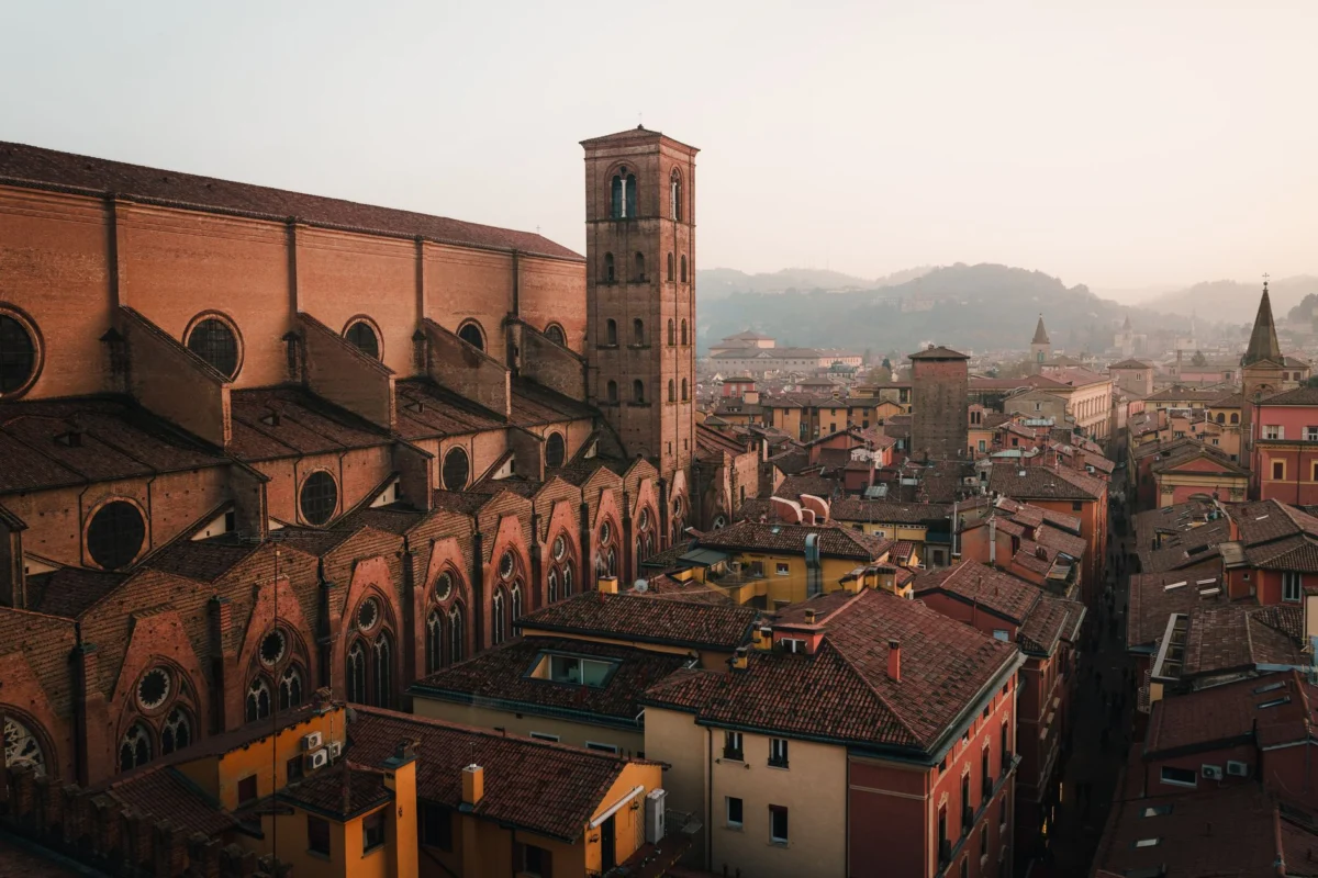 Romantic sunset view over Bologna's iconic cityscape