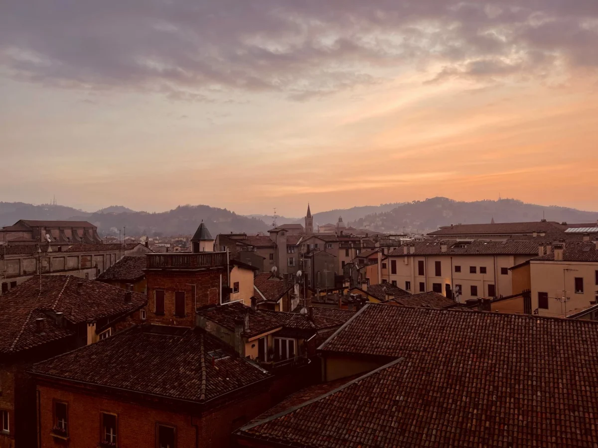 Breathtaking sunset over Bologna showcasing iconic landmarks