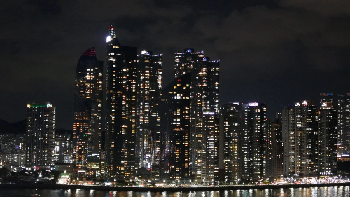Night view of Busan's skyline with illuminated skyscrapers