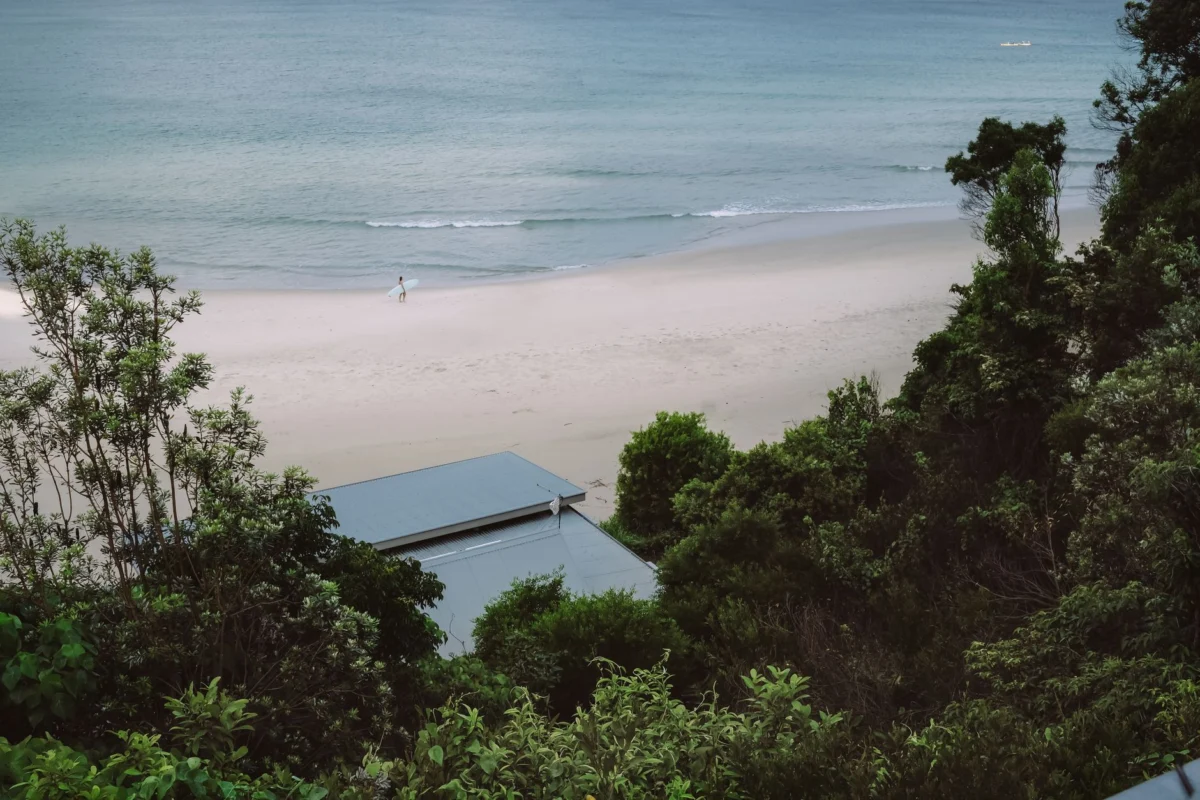 A romantic sunset at Byron Bay with couples enjoying the view