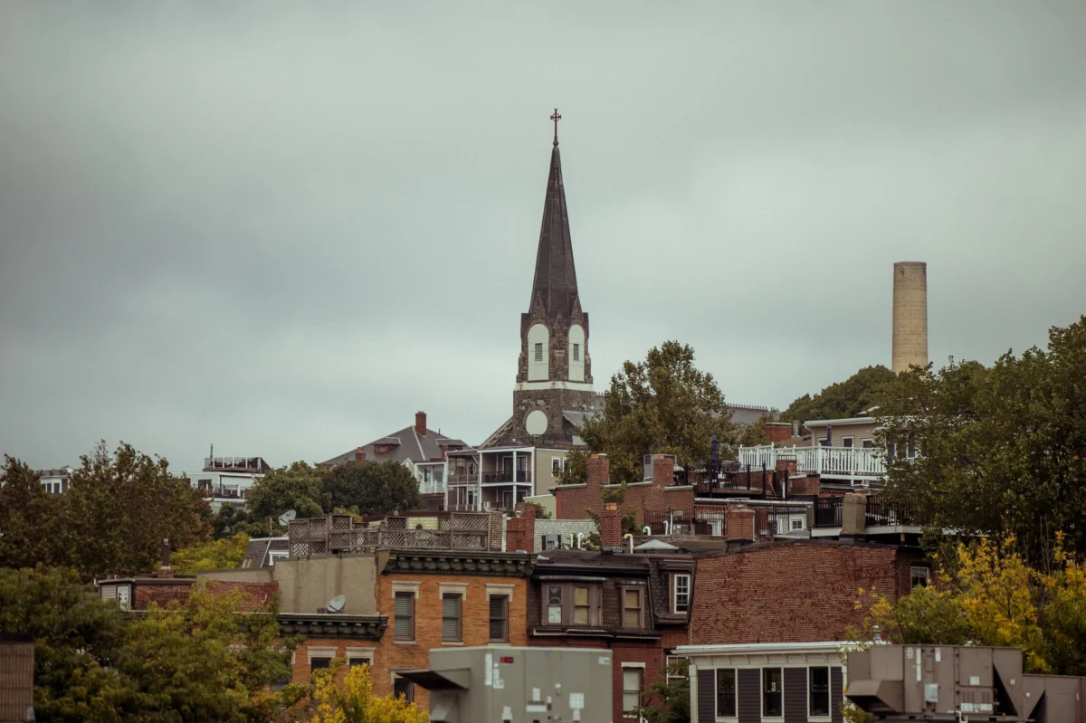 Charlestown skyline at sunset with historical landmarks