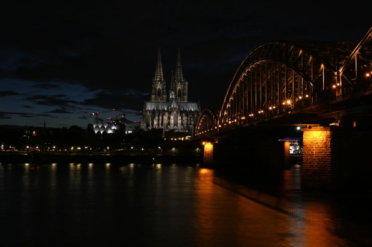 Cologne's iconic skyline with the Cathedral illuminated at night