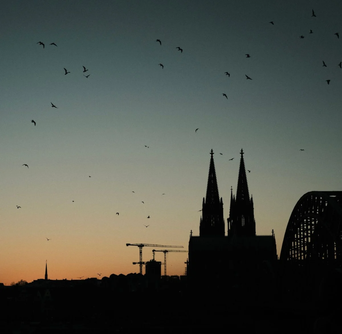 Stunning view of Cologne Cathedral silhouetted against the city skyline