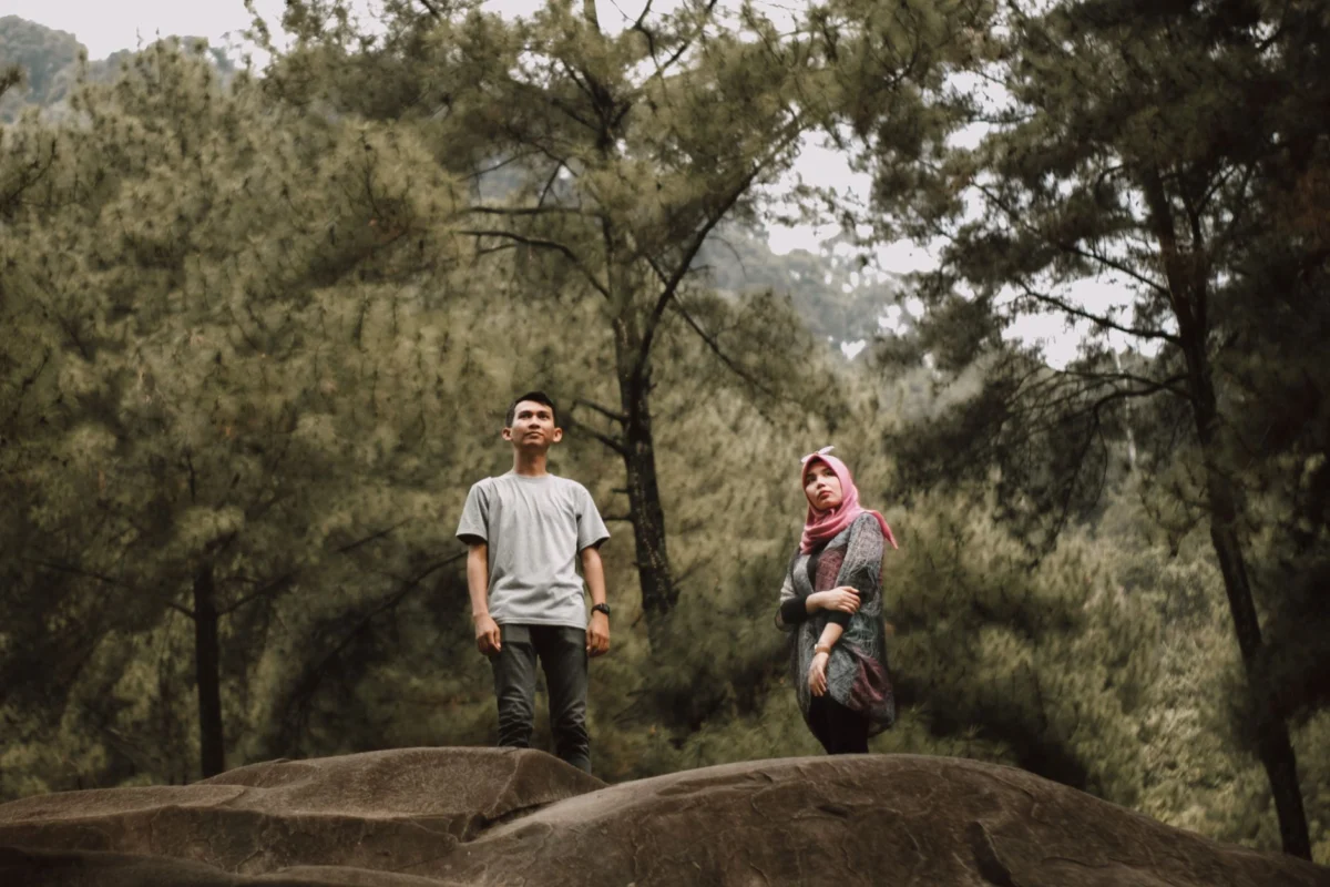 Couple hiking in scenic landscape of Tutong