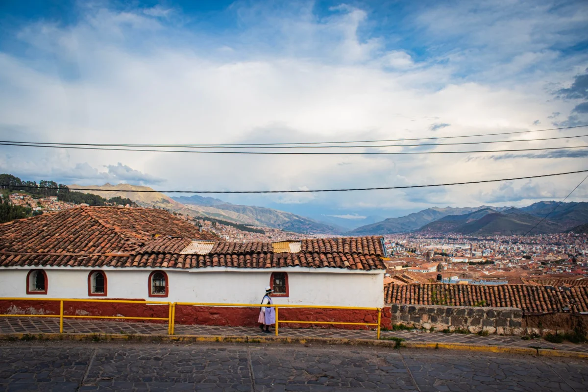 A scenic view of Cusco’s skyline at sunset